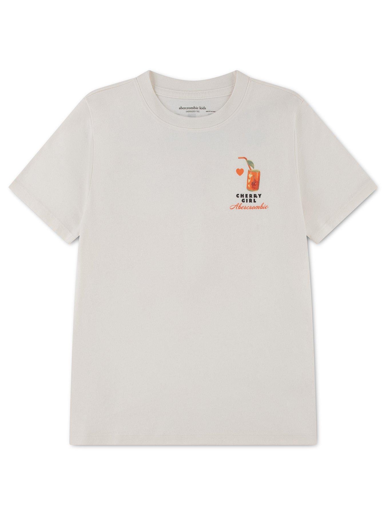 Image 1 of 3 of Abercrombie & Fitch Girls Oversized Cherry Soda Print T-Shirt - Cream