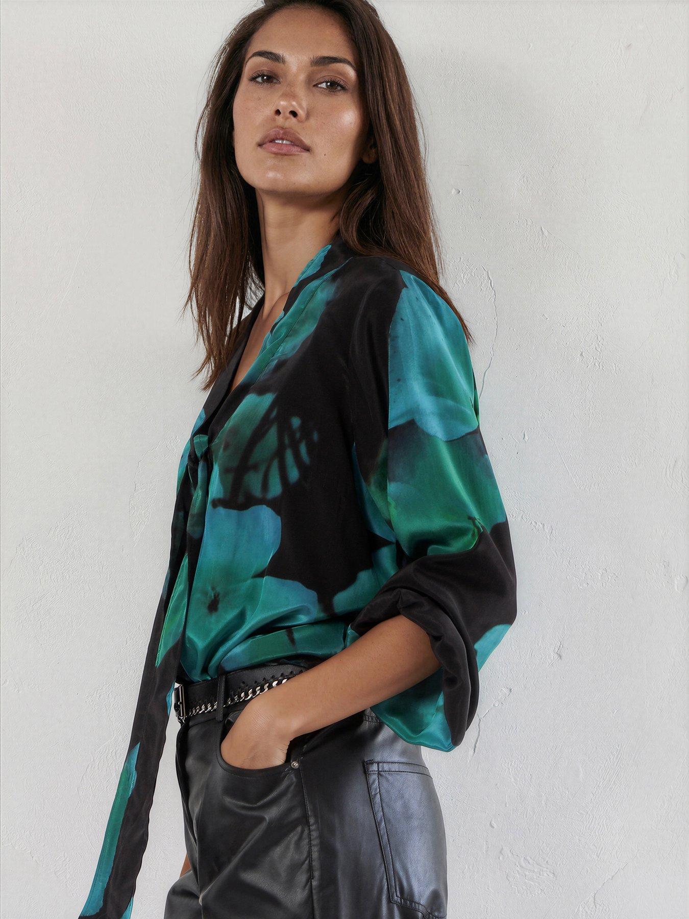 Image 1 of 7 of Religion Evie Blouse In Large Blue And Floral Fire Print With Sash Tie - Green