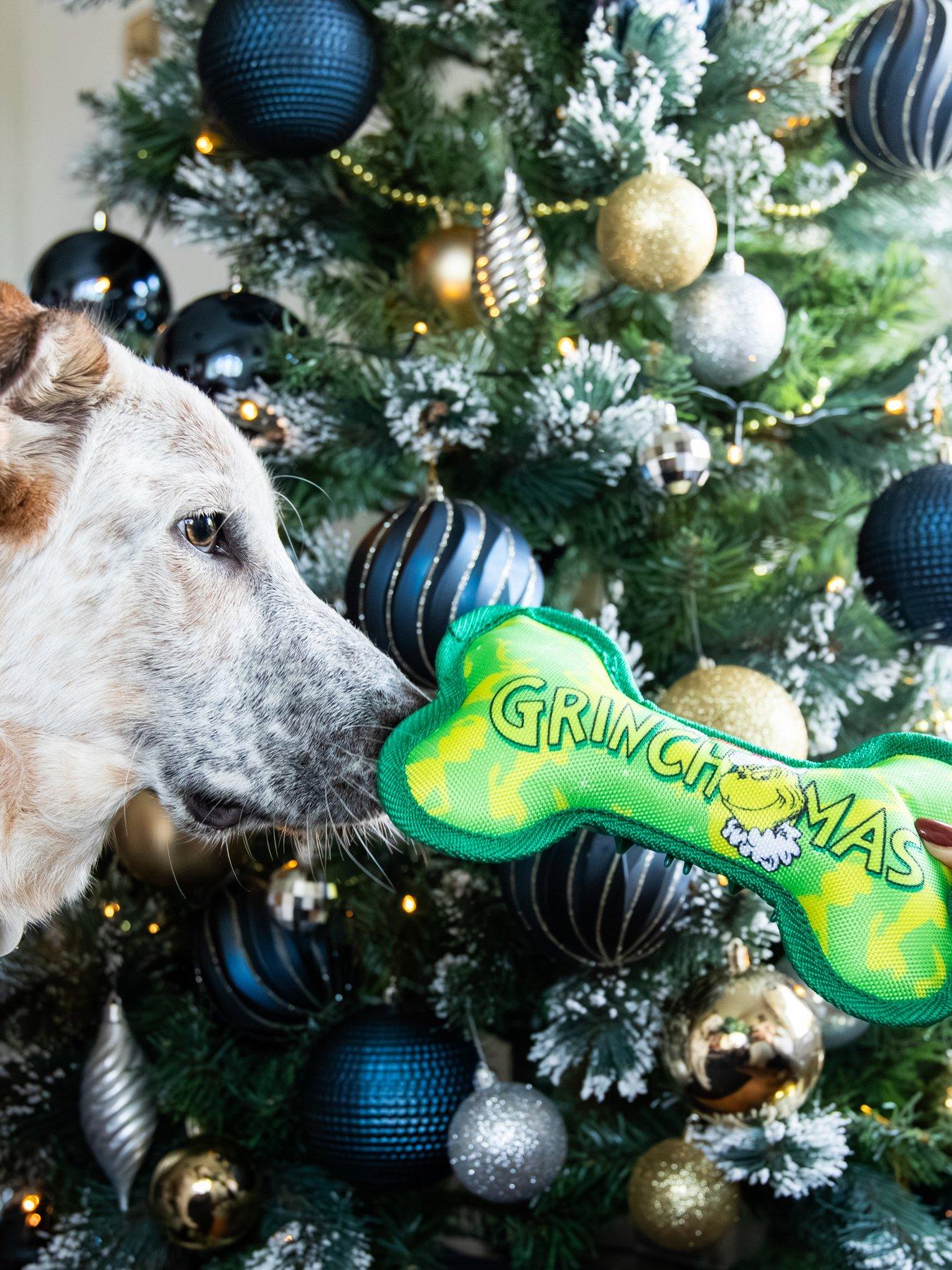 Image 6 of 7 of Rosewood Grinch Bone Toy