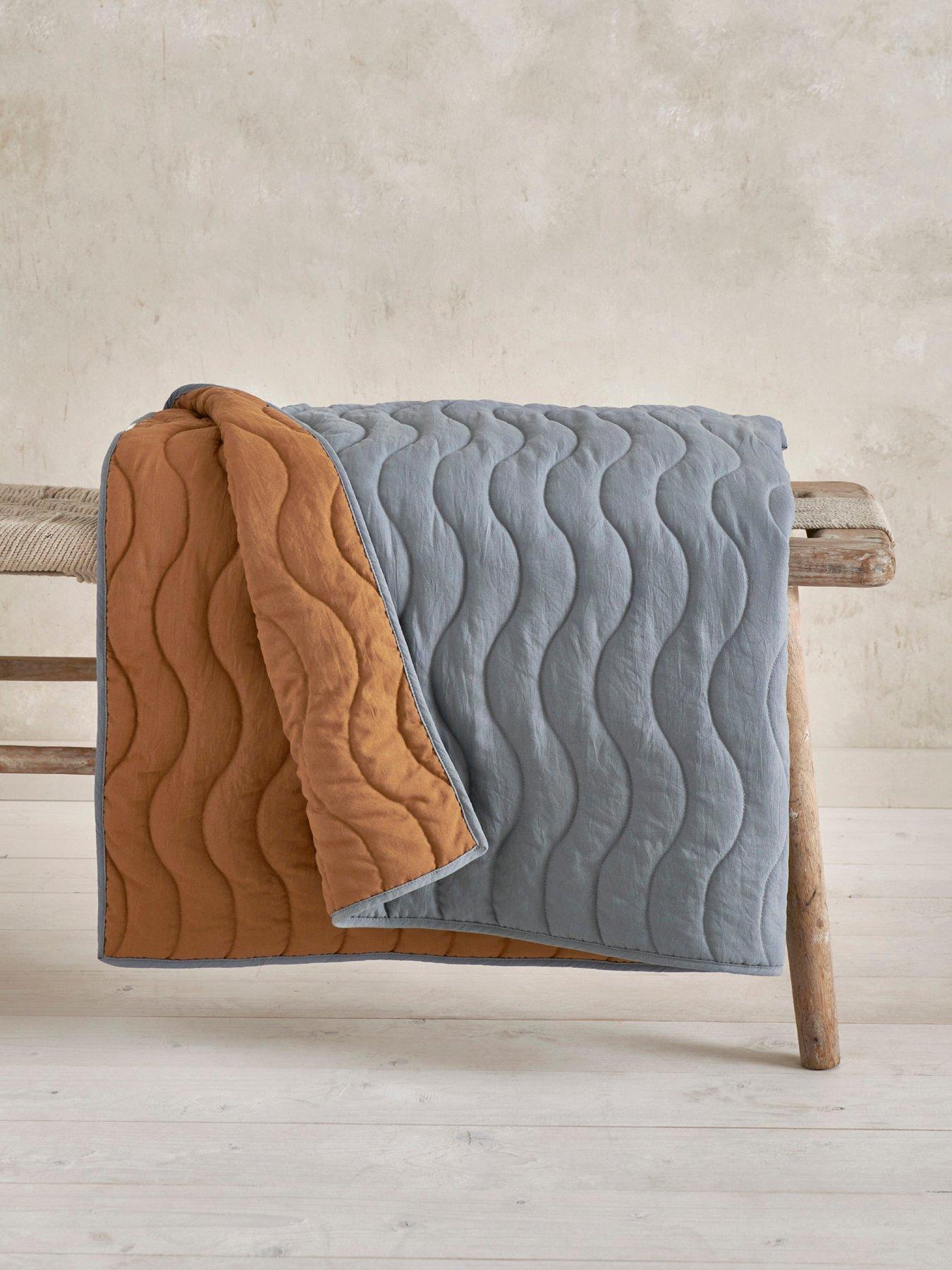 Image 1 of 5 of Mamas & Papas Cotbed/Cot Quilt - Blue Mustard Wave