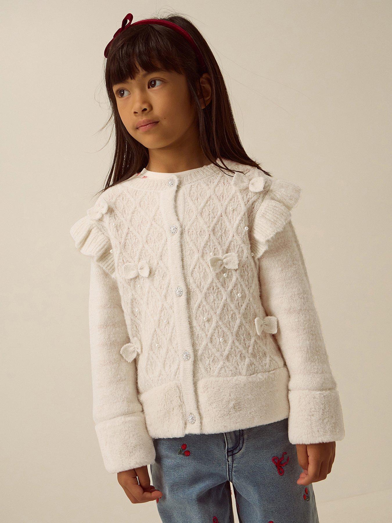 Image 1 of 4 of Monsoon Girls 3D Bow Faux Fur Trim Button Through Cardigan - Light Cream