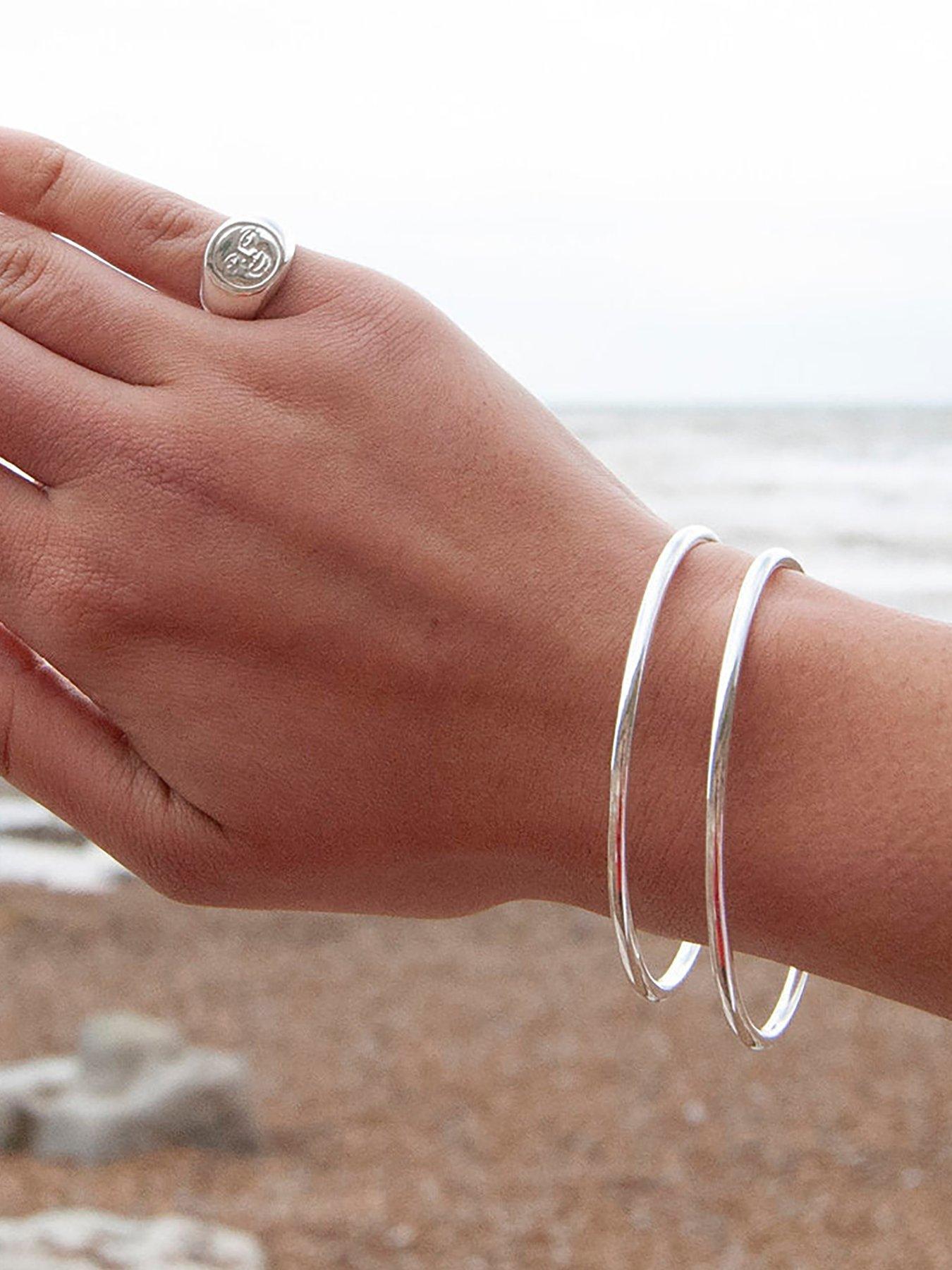 Image 1 of 4 of Seol + Gold Sterling Silver Solid Rounded Bangle
