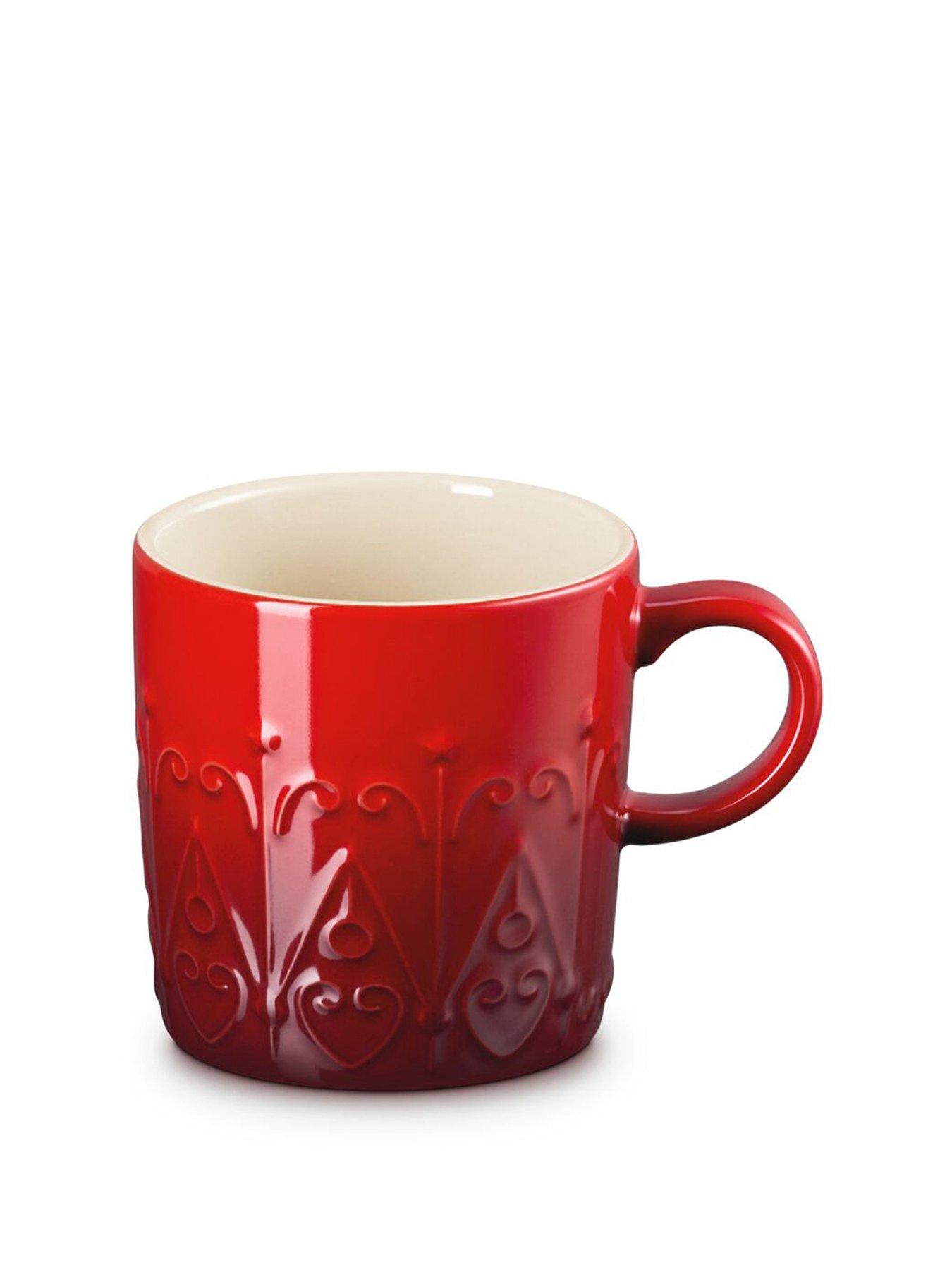 Image 1 of 6 of Le Creuset Le Creuset Stoneware London 350ml Coffee Mug Christmas Relief Cerise