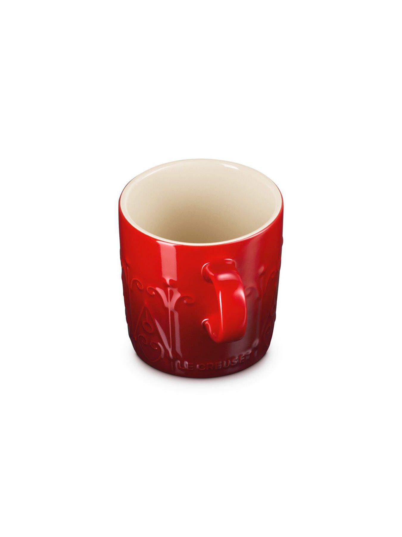 Image 4 of 6 of Le Creuset Le Creuset Stoneware London 350ml Coffee Mug Christmas Relief Cerise