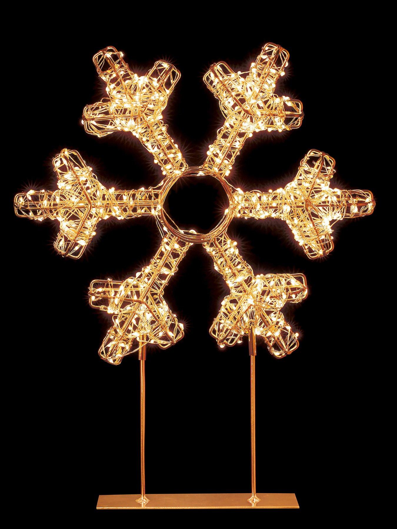Image 1 of 4 of Premier Decorations 45cm Twinkling Lit Rose Gold Table Top Snowflake