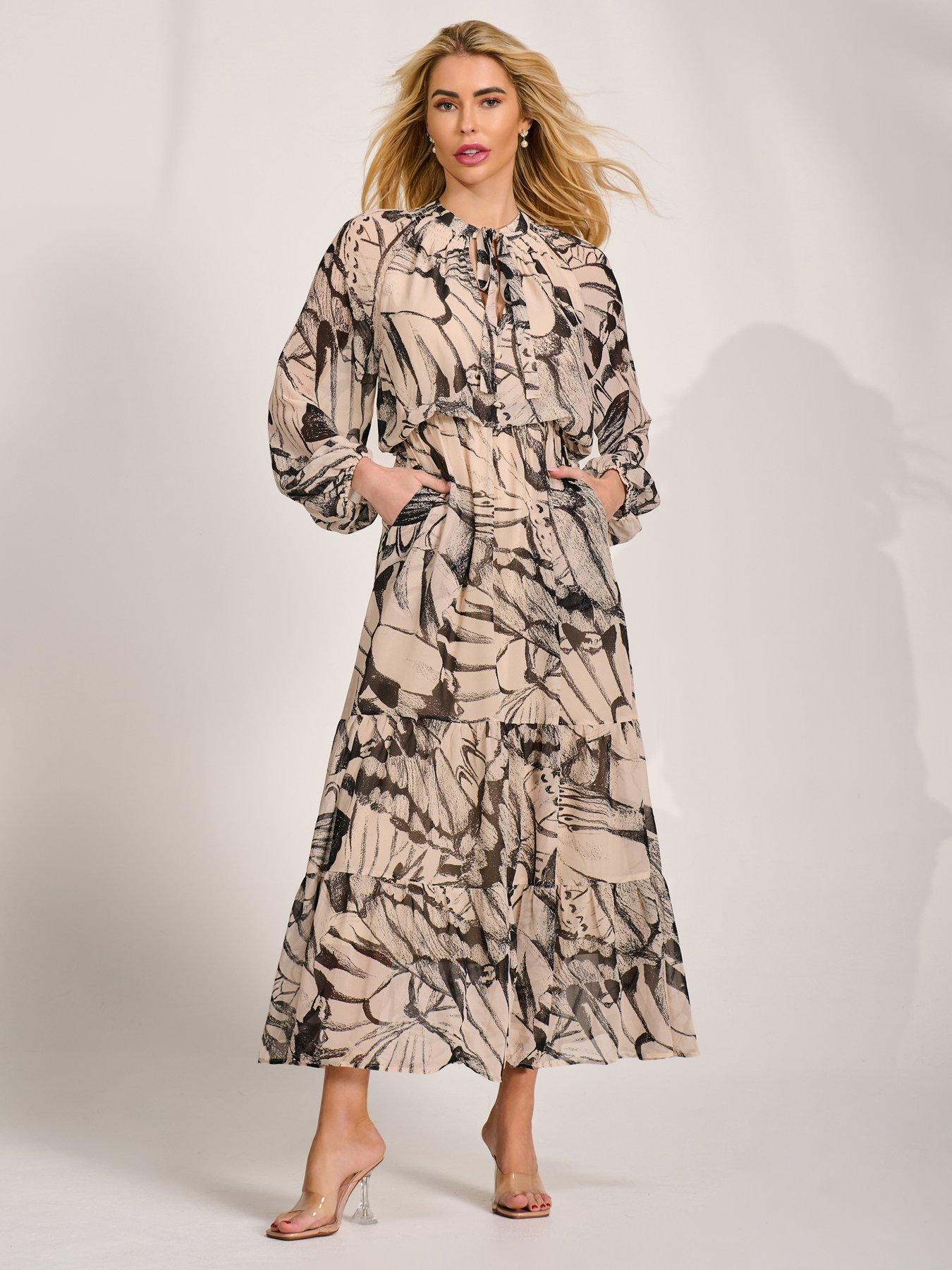 Image 1 of 6 of Jolie Moi Long Sleeve Tie Neck Maxi Dress
