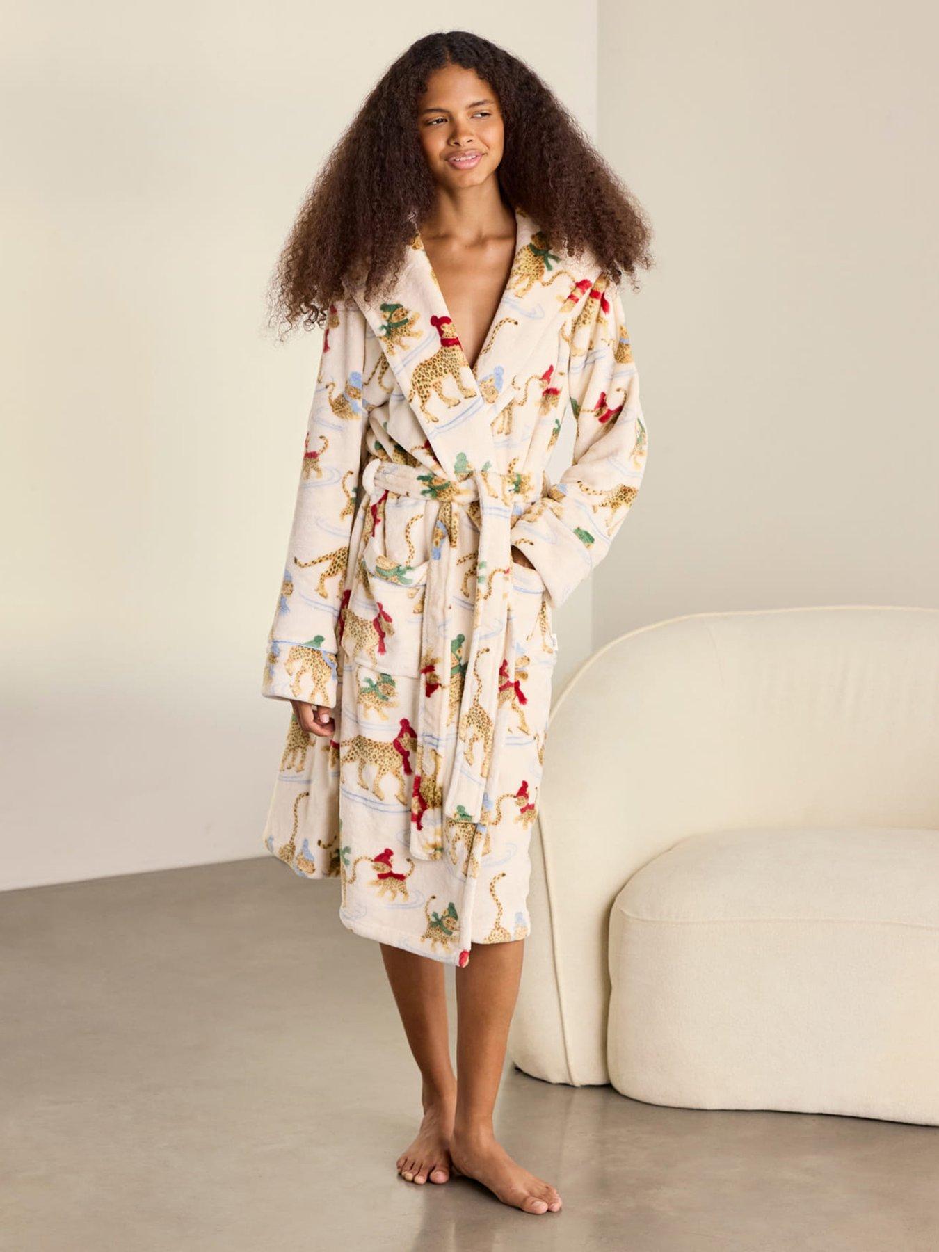 Image 1 of 6 of CHELSEA PEERS Chelsea Peers Fleece Ice Skating Leopards Print Hooded Dressing Gown - Off White