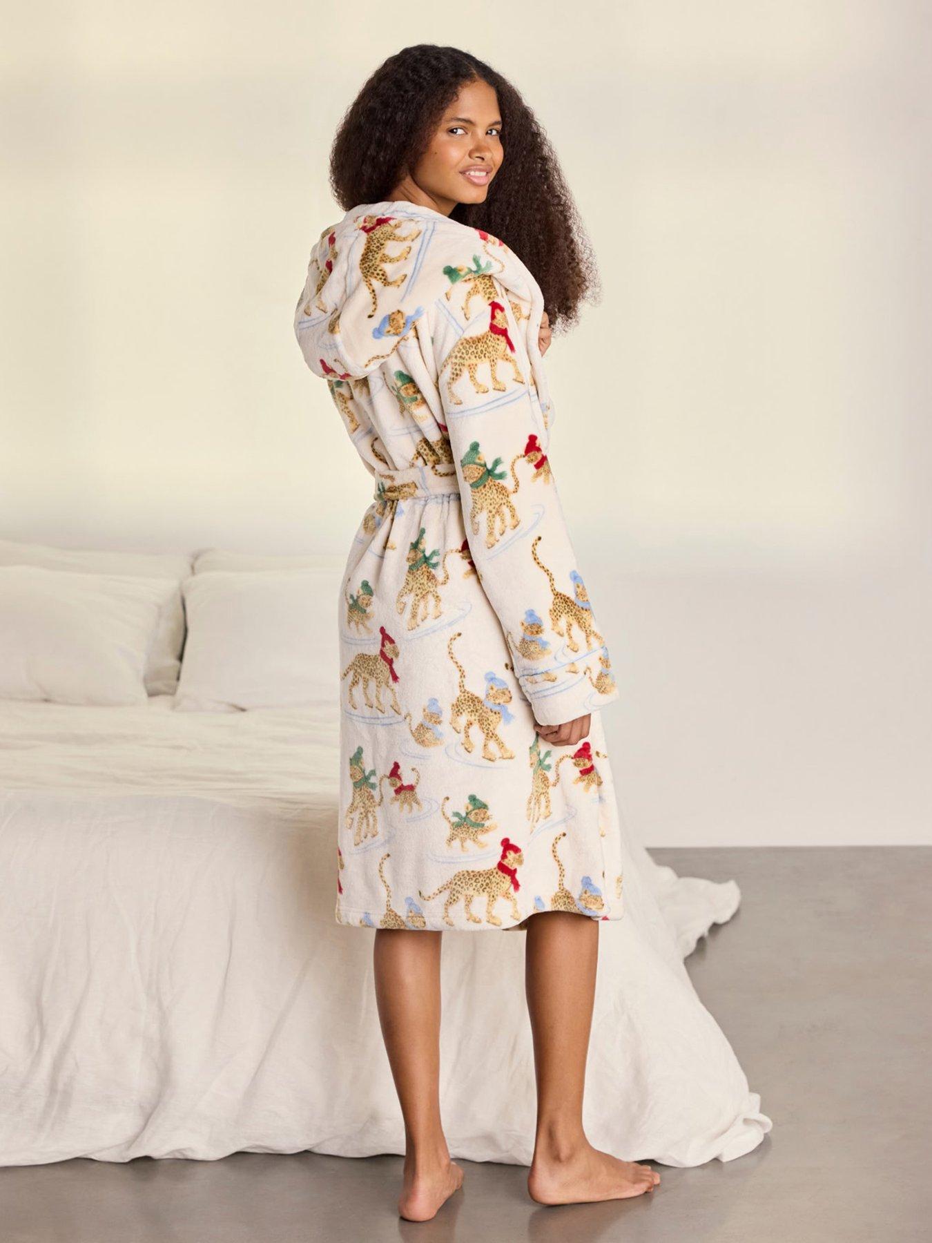 Image 2 of 6 of CHELSEA PEERS Chelsea Peers Fleece Ice Skating Leopards Print Hooded Dressing Gown - Off White