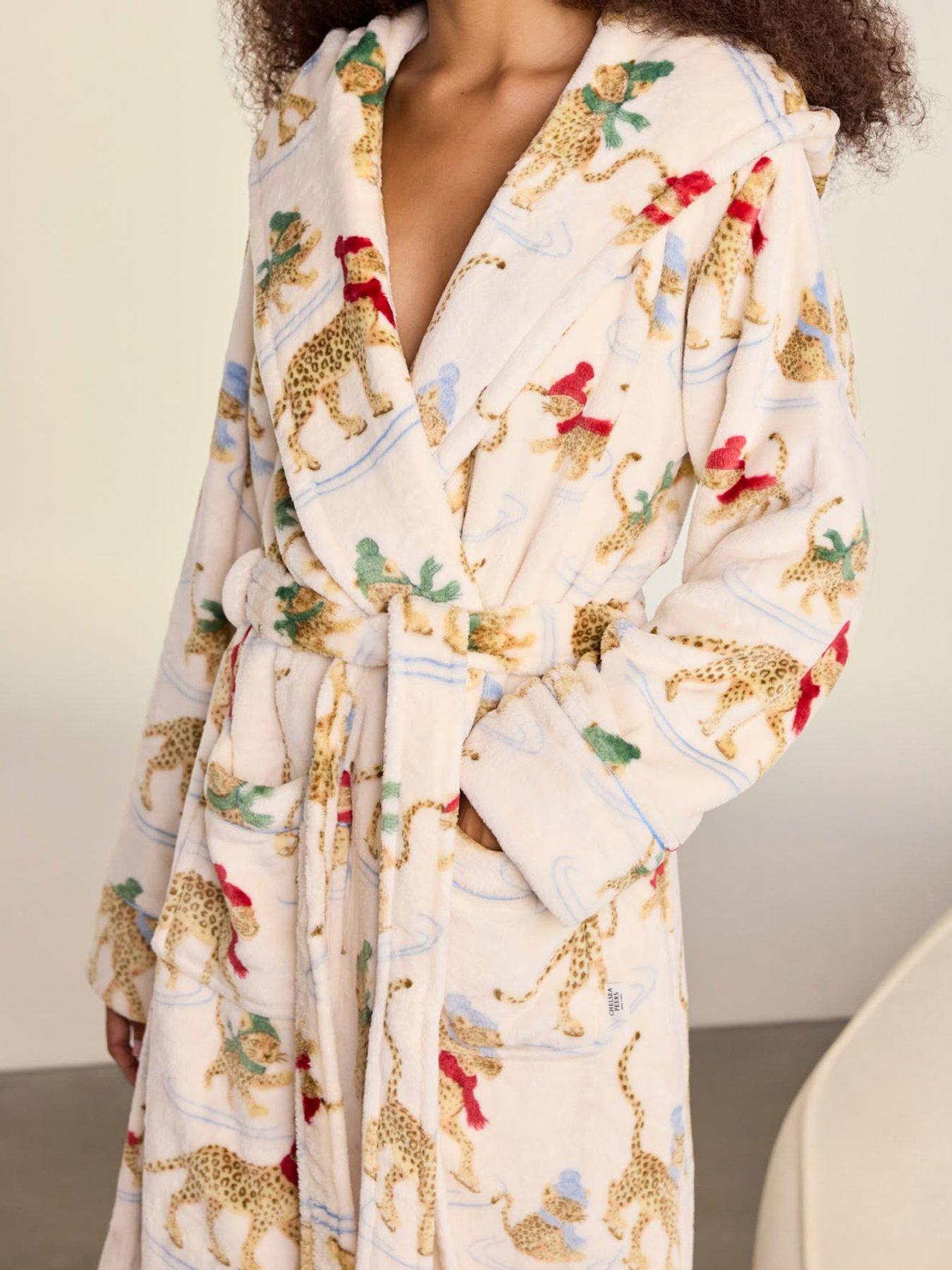 Image 4 of 6 of CHELSEA PEERS Chelsea Peers Fleece Ice Skating Leopards Print Hooded Dressing Gown - Off White