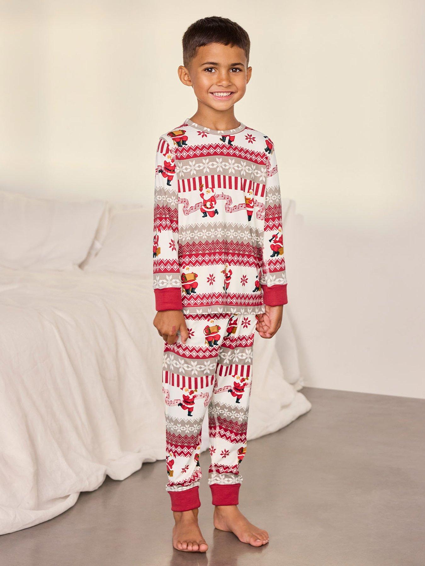Image 1 of 7 of CHELSEA PEERS Chelsea Peers Kids Musical Santa Fair Isle Print Long Pyjama Set - Off White