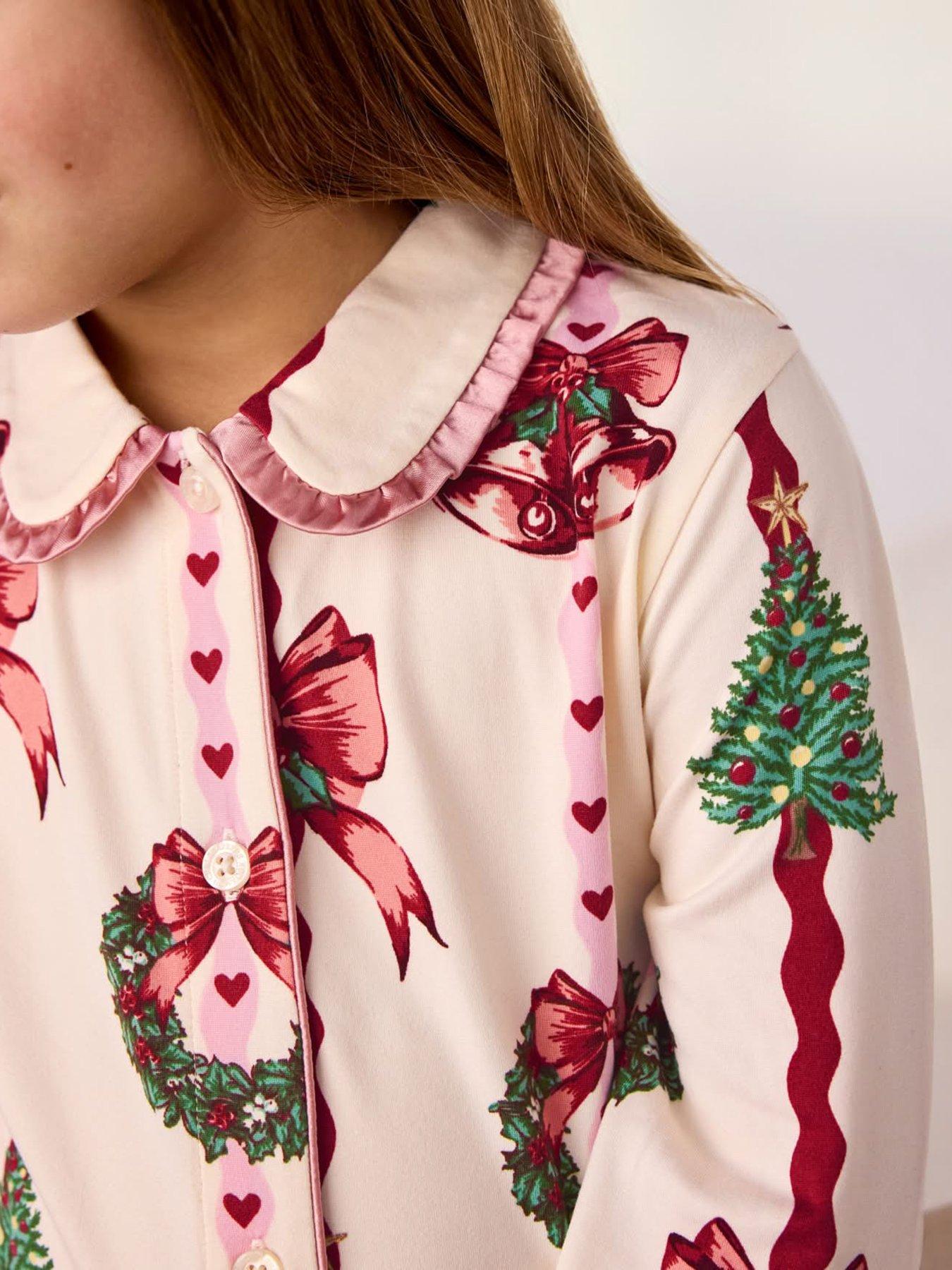 Image 5 of 7 of CHELSEA PEERS Chelsea Peers Kids Christmas Ribbon Stripe Print Long Pyjama Set - Off White