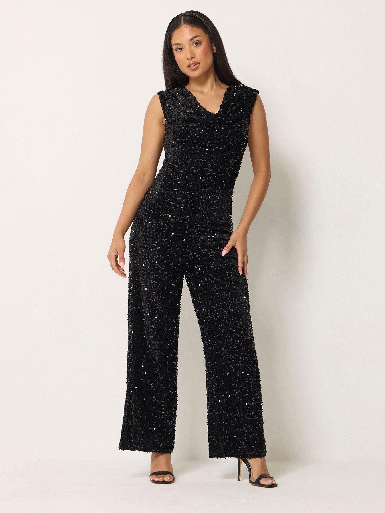 Image 1 of 4 of M&Co Petite Petite Sequin Velvet Cowl Neck Jumpsuit