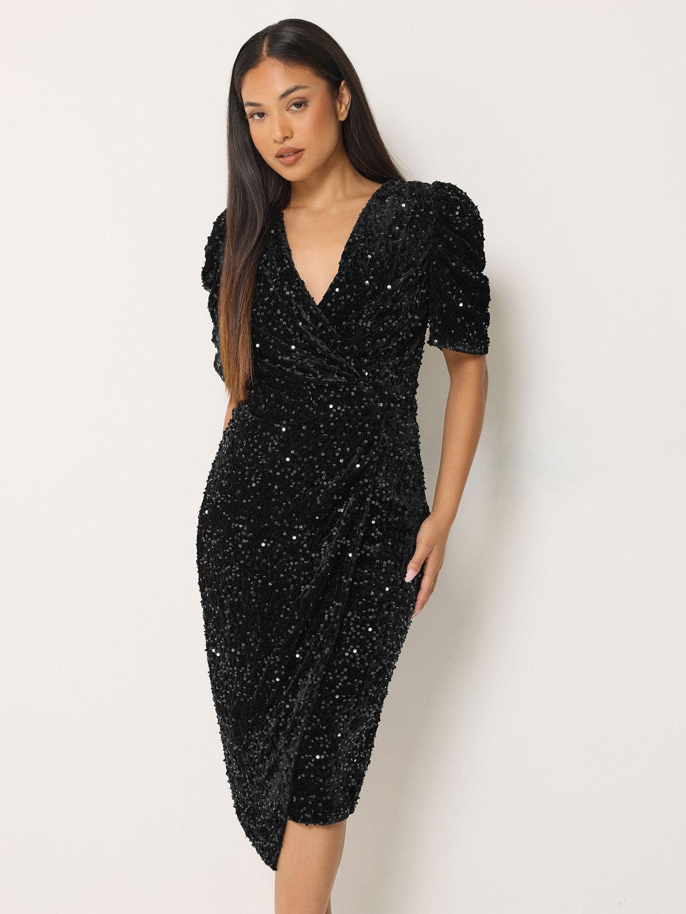 Image 1 of 4 of M&Co Petite Petite Sequin Velvet Short Sleeve Wrap Dress