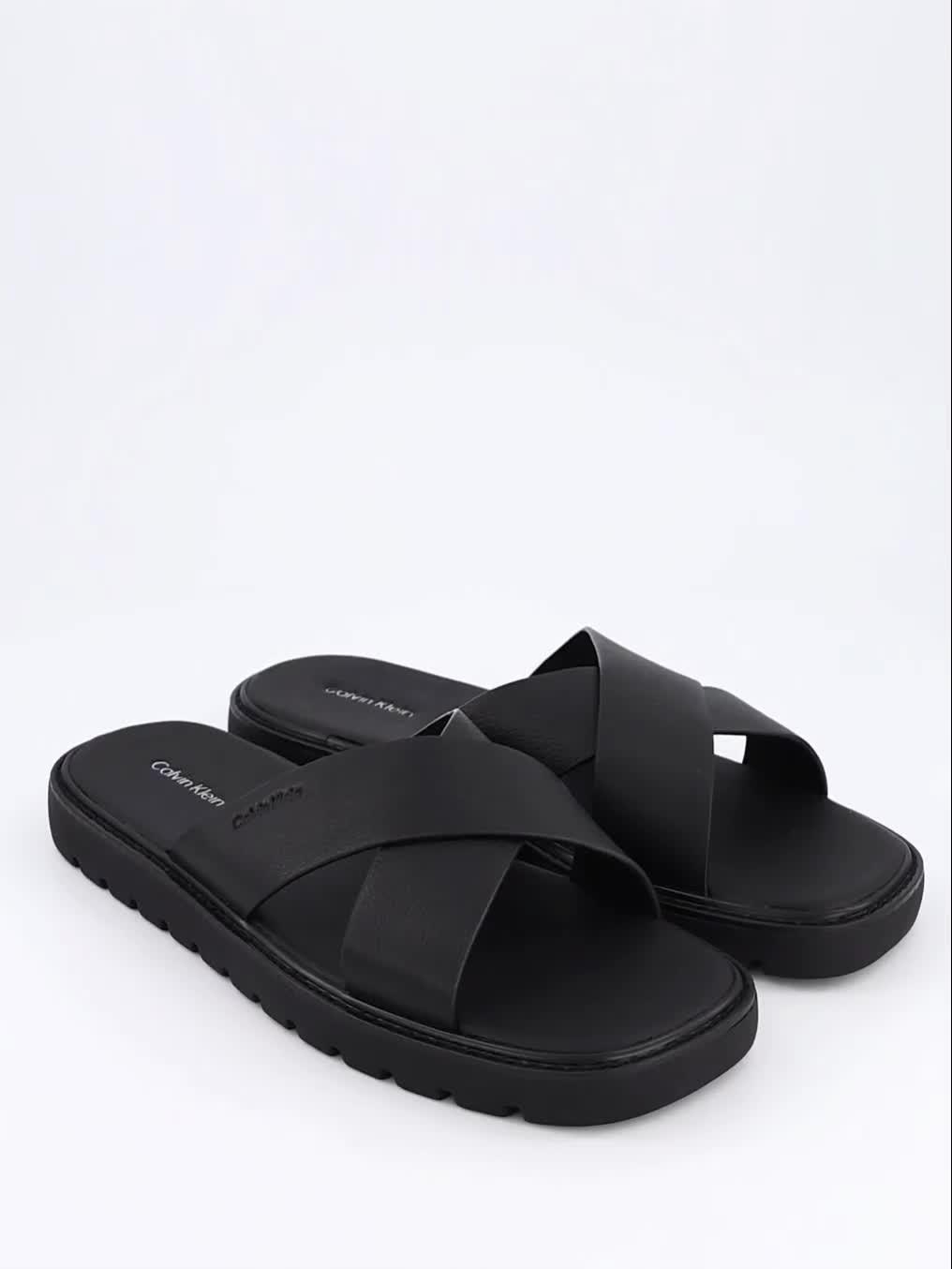 Image thumbnail 7 of 7 of Calvin Klein Square Toe Cross-Strap Moulded Leather Sandal - Black