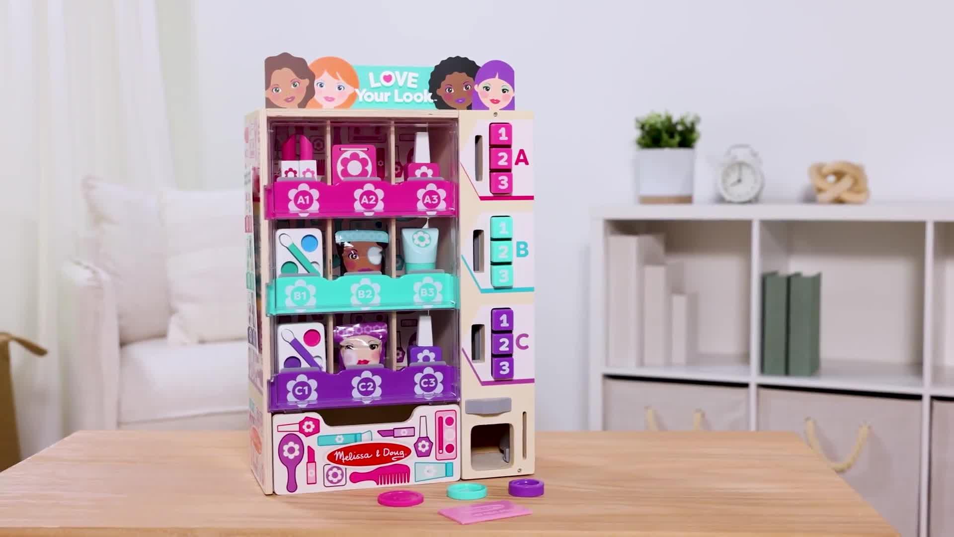 Image thumbnail 8 of 8 of Melissa & Doug Button-Press Beauty Vending Machine Kiosk Playset